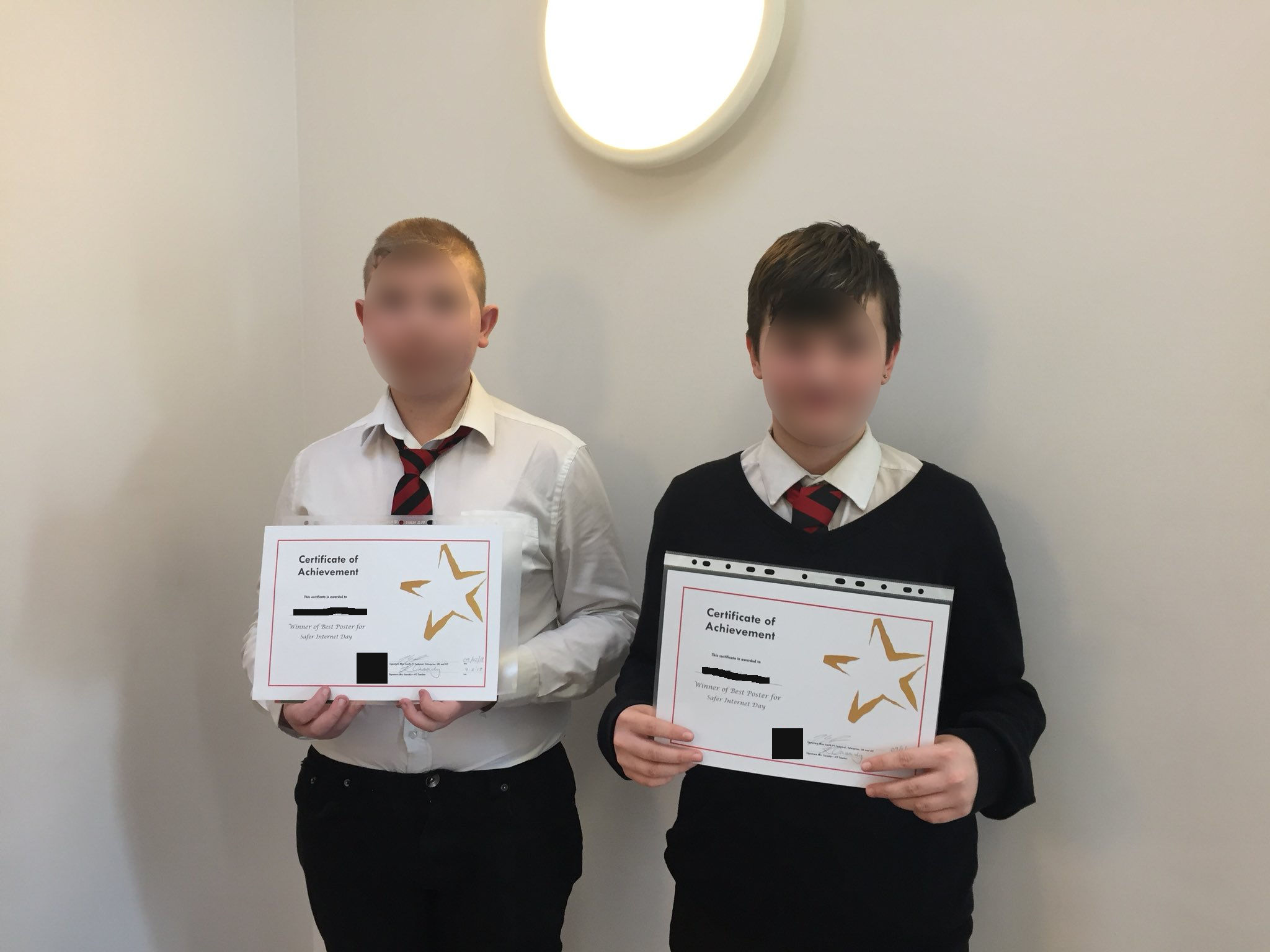 More students holding up certificates for safer internet day